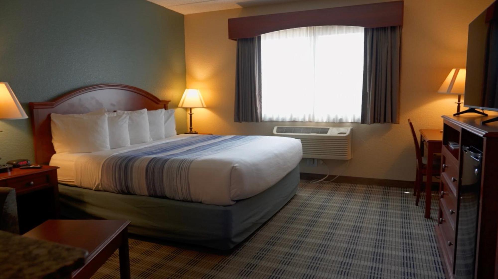 Americinn By Wyndham Чиппева-Фолс Экстерьер фото